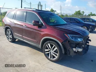 2017 Honda Pilot Touring with VIN 5FNYF5H96HB038413, listed as a IAAI auction lot 42594065 with 130,501 mi miles and . Bid and sale history available at DreamBid. Image 1.