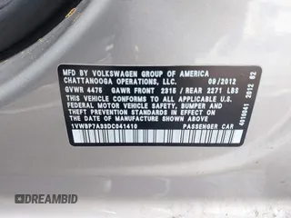 2013 Volkswagen Passat SE with VIN 1VWBP7A33DC041410, listed as a IAAI auction lot 42427033 with Not provided miles and . Bid and sale history available at DreamBid. Image 9.