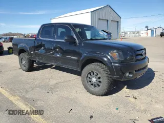 2005 Toyota Tundra Limited with VIN 5TBDT48125S470024, listed as a Copart auction lot 48203695 with 141,036 mi miles and Salvage title. Bid and sale history available at DreamBid. Image 4.