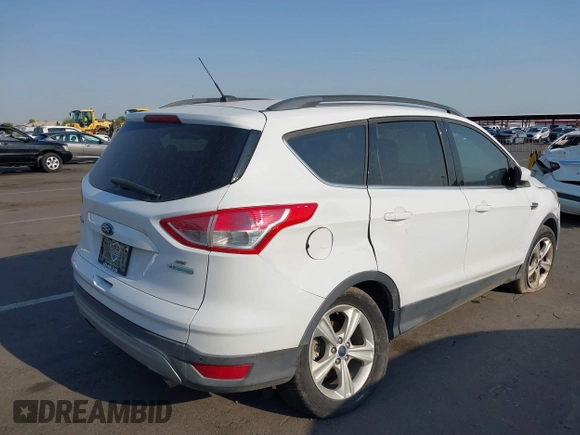 2016 Ford Escape SE z VIN 1FMCU0GXXGUC13444, wystawiony jako IAAI lot #39566364 z przebiegiem 162 059 mil mil oraz . Historia ofert i sprzedaży dostępna na DreamBid. Obrazek 4.