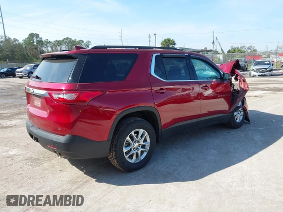 2021 Chevrolet Traverse LT Cloth with VIN 1GNEVGKW1MJ100973, listed as a IAAI auction lot 41477074 with 56,167 mi miles. Bid and sale history available at carsss.com. Image 4.