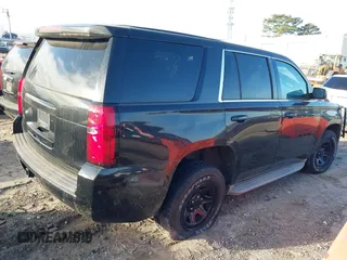 2015 Chevrolet Tahoe Commercial z VIN 1GNLC2EC4FR535329, wystawiony jako IAAI lot #41643486 z przebiegiem 185 326 mil mil oraz . Historia ofert i sprzedaży dostępna na DreamBid. Obrazek 4.