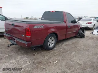 2004 Ford F-150 Heritage XL with VIN 2FTRF17204CA08424, listed as a IAAI auction lot 41588440 with 197,523 mi miles. Bid and sale history available at carsss.com. Image 4.
