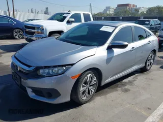 2017 Honda Civic Sedan EX-L with VIN 2HGFC1F76HH637432, listed as a IAAI auction lot 42007237 with 117,134 mi miles. Bid and sale history available at carsss.com. Image 2.