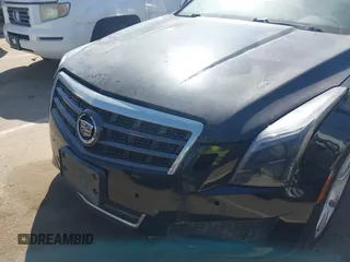 2013 Cadillac ATS z VIN 1G6AA5RA8D0139683, wystawiony jako IAAI lot #42410090 z przebiegiem 127 323 mil mil oraz . Historia ofert i sprzedaży dostępna na DreamBid. Obrazek 12.
