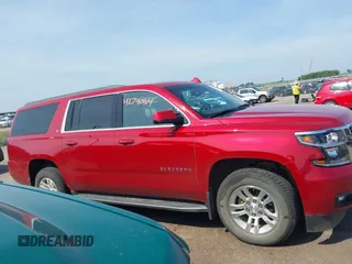 2015 Chevrolet Suburban LT with VIN 1GNSKJKC5FR726299, listed as a IAAI auction lot 42740904 with 96,700 mi miles and . Bid and sale history available at DreamBid. Image 13.