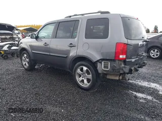 2014 Honda Pilot EX-L with VIN 5FNYF4H51EB025362, listed as a IAAI auction lot 41307101 with 162,688 mi miles. Bid and sale history available at carsss.com. Image 3.