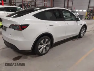 2022 Tesla Model Y Long Range z VIN 7SAYGDEE3NF358487, wystawiony jako IAAI lot #42036969 z przebiegiem 52 723 mil mil oraz . Historia ofert i sprzedaży dostępna na DreamBid. Obrazek 4.