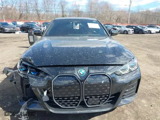 2024 BMW i4 xDrive40 with VIN WBY83FB04RFT19615, listed as a IAAI auction lot 41679918 with 3,883 mi miles. Bid and sale history available at carsss.com. Image 12.