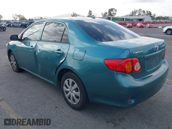 2010 Toyota Corolla with VIN JTDBU4EE4A9104965, listed as a IAAI auction lot 41956372 with 206,535 mi miles. Bid and sale history available at carsss.com. Image 3.