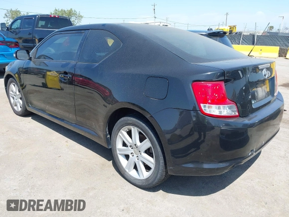 2012 Scion tC with VIN JTKJF5C79C3025581, listed as a IAAI auction lot 42170728 with 92,842 mi miles. Bid and sale history available at carsss.com. Image 3.
