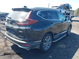 2020 Honda CR-V Touring with VIN 2HKRW2H98LH660573, listed as a IAAI auction lot 41524610 with 37,493 mi miles and . Bid and sale history available at DreamBid. Image 4.