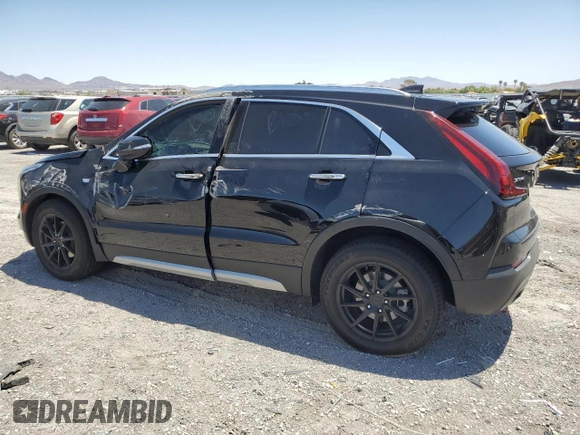2021 Cadillac XT4 FWD Premium Luxury с VIN 1GYFZCR4XMF004996, выставлен на аукционе Copart как лот 61270355 с пробегом Не указан миль и Списание • Salvage title. История ставок и продаж доступна на DreamBid. Изображение 2.