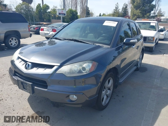 2007 Acura RDX Tech Pkg with VIN 5J8TB18527A802889, listed as a IAAI auction lot 41882486 with 304,605 mi miles. Bid and sale history available at carsss.com. Image 6.