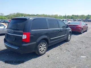 2014 Chrysler Town & Country Touring with VIN 2C4RC1BG4ER217711, listed as a IAAI auction lot 42155688 with 370,937 mi miles. Bid and sale history available at carsss.com. Image 4.