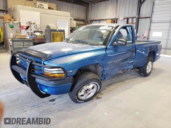 1999 Dodge Dakota SLT with VIN 1B7FL26X0XS298131, listed as a Copart auction lot 69590254 with 162,606 mi miles and Salvage Title. Bid and sale history available at carsss.com. Image 1.