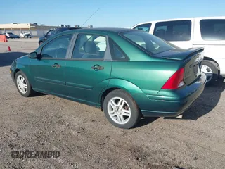 2001 Ford Focus SE with VIN 1FAFP34301W153462, listed as a IAAI auction lot 42000065 with 121,946 mi miles and . Bid and sale history available at carsss.com. Image 3.