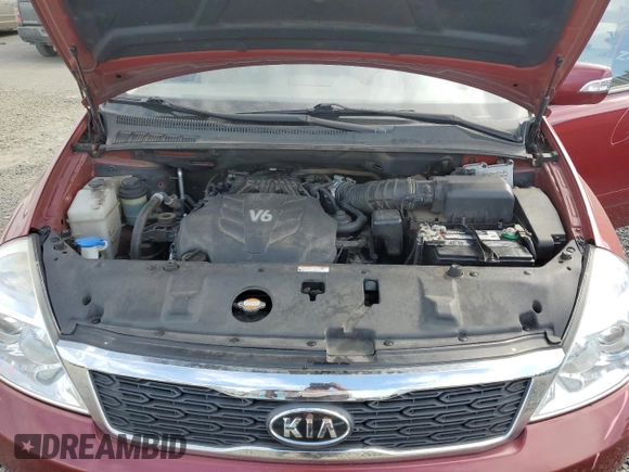2011 Kia Sedona LX with VIN KNDMG4C72B6369858, listed as a Copart auction lot 70339124 with 165,640 mi miles and Salvage Title. Bid and sale history available at carsss.com. Image 12.