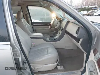 2004 Lincoln Aviator Luxury z VIN 5LMEU88H34ZJ50200, wystawiony jako IAAI lot #41775107 z przebiegiem 220 930 mil mil oraz . Historia ofert i sprzedaży dostępna na DreamBid. Obrazek 5.