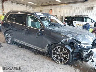 2021 BMW X7 xDrive40i with VIN 5UXCW2C09M9E94039, listed as a IAAI auction lot 41473138 with 1 mi miles. Bid and sale history available at carsss.com. Image 1.