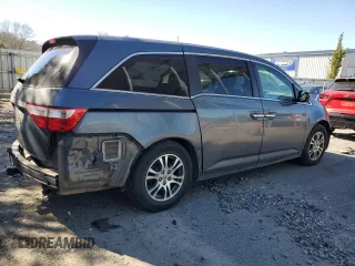2012 Honda Odyssey EX-L with VIN 5FNRL5H62CB015738, listed as a Copart auction lot 47268455 with 150,924 mi miles and Salvage Title. Bid and sale history available at DreamBid. Image 3.
