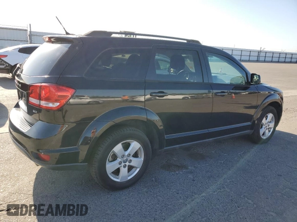 2012 Dodge Journey SXT with VIN 3C4PDCBG2CT321589, listed as a Copart auction lot 58360935 with 215,078 mi miles and Clean title. Bid and sale history available at DreamBid. Image 3.