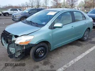 2009 Toyota Yaris with VIN JTDBT903794060474, listed as a IAAI auction lot 42005903 with 104,607 mi miles. Bid and sale history available at carsss.com. Image 2.