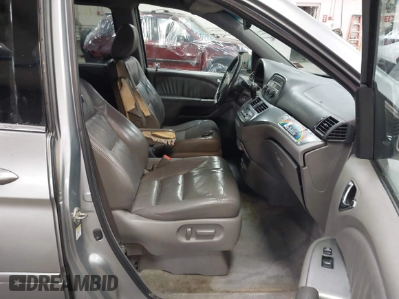 2008 Honda Odyssey EX-L with VIN 5FNRL38738B030818, listed as a IAAI auction lot 41718717 with 247,994 mi miles and . Bid and sale history available at DreamBid. Image 5.