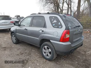 2009 Kia Sportage LX with VIN KNDJF724997570871, listed as a IAAI auction lot 41003267 with 231,654 mi miles and . Bid and sale history available at carsss.com. Image 3.