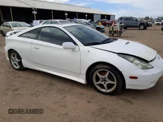 2000 Toyota Celica GTS with VIN JTDDY38T3Y0023164, listed as a Copart auction lot 66688215 with 246,571 mi miles and Clean title. Bid and sale history available at DreamBid. Image 4.