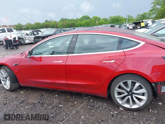 2018 Tesla Model 3 Long Range Battery with VIN 5YJ3E1EA6JF052659, listed as a IAAI auction lot 42093903 with 49,255 mi miles and . Bid and sale history available at DreamBid. Image 15.
