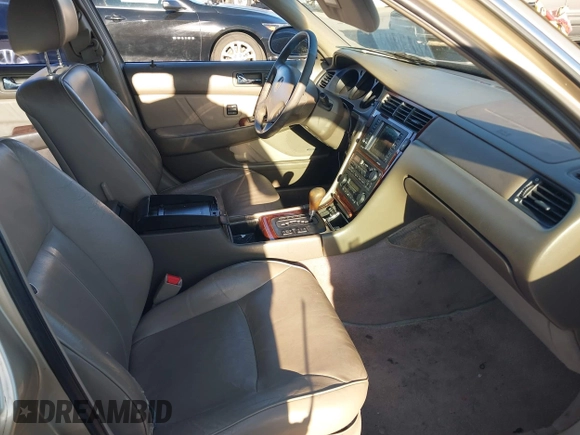 1999 Acura RL with VIN JH4KA9661XC005883, listed as a IAAI auction lot 40560595 with 165,195 mi miles. Bid and sale history available at carsss.com. Image 5.