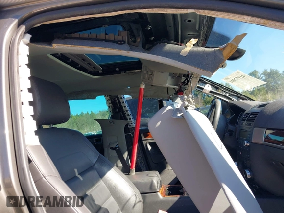 2010 Volkswagen Touareg VR6 with VIN WVGBF7A96AD004069, listed as a IAAI auction lot 41972994 with Not Provided miles and . Bid and sale history available at DreamBid. Image 6.
