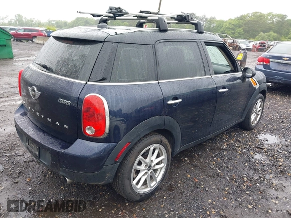 2015 MINI Countryman z VIN WMWZB3C59FWR43890, wystawiony jako IAAI lot #42372407 z przebiegiem 131 884 mil mil oraz . Historia ofert i sprzedaży dostępna na DreamBid. Obrazek 4.