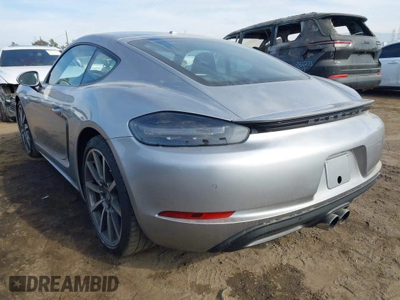 2021 Porsche Cayman with VIN WP0AA2A82MS260377, listed as a IAAI auction lot 40970360 with 23,785 mi miles and . Bid and sale history available at DreamBid. Image 3.