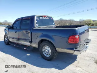 2003 Ford F-150 XLT with VIN 1FTRW07633KD25329, listed as a Copart auction lot 49438145 with 274,516 mi miles and Salvage Title. Bid and sale history available at carsss.com. Image 2.
