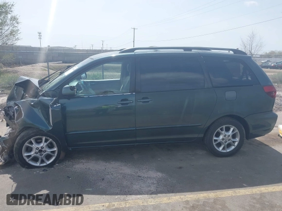 2005 Toyota Sienna XLE with VIN 5TDBA22C65S040922, listed as a IAAI auction lot 41988449 with 292,167 mi miles. Bid and sale history available at carsss.com. Image 14.
