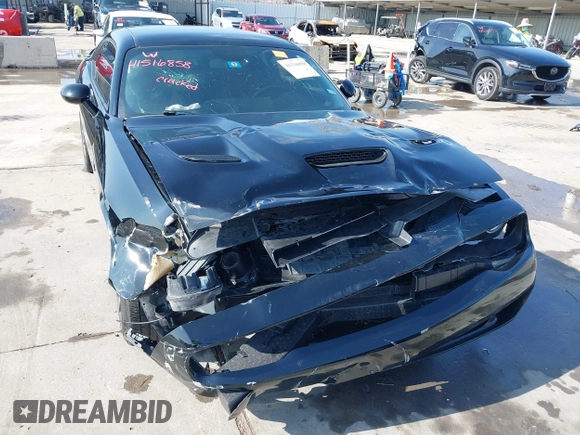2021 Dodge Challenger R/T Scat Pack z VIN 2C3CDZFJXMH509833, wystawiony jako IAAI lot #41516858 z przebiegiem 66 880 mil mil oraz . Historia ofert i sprzedaży dostępna na DreamBid. Obrazek 6.