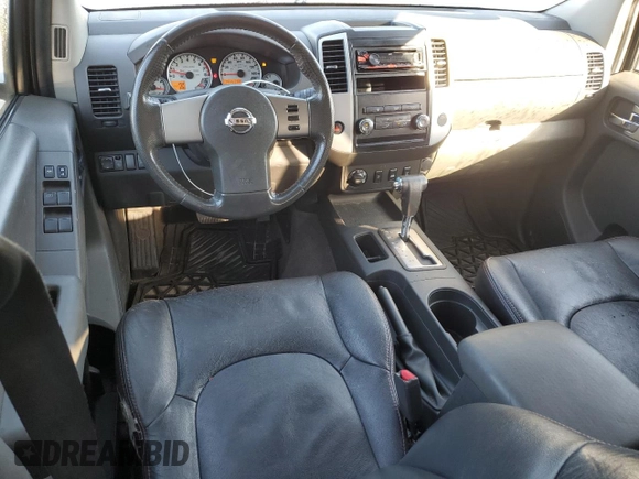 2010 Nissan Frontier LE with VIN 1N6AD0EV1AC407478, listed as a Copart auction lot 82302504 with 146,560 mi miles and Salvage title. Bid and sale history available at DreamBid. Image 8.