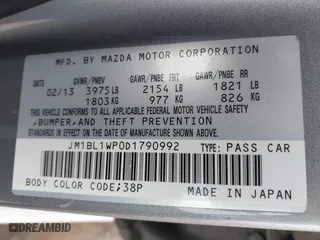 2013 Mazda Mazda3 i Grand Touring with VIN JM1BL1WP0D1790992, listed as a IAAI auction lot 41986869 with 249,902 mi miles. Bid and sale history available at carsss.com. Image 9.