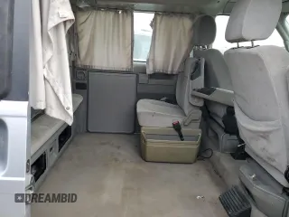 2003 Volkswagen EuroVan MV с VIN WV2NB47083H002700, выставлен на аукционе Copart как лот 76117874 с пробегом 186 942 миль миль и На запчасти • Non repairable. История ставок и продаж доступна на DreamBid. Изображение 11.