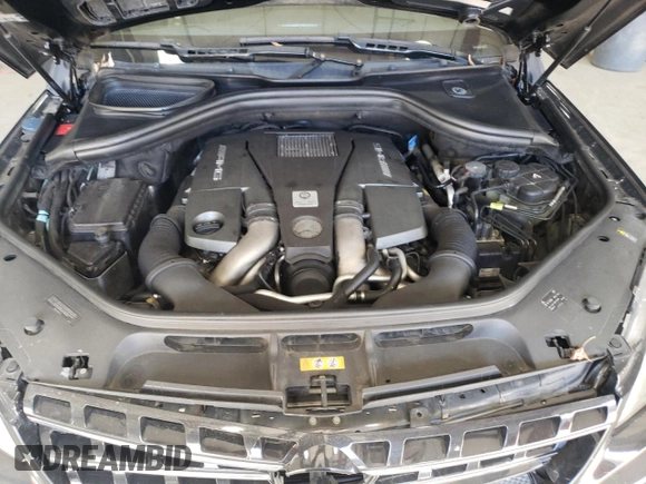 2013 Mercedes-Benz M ML 63 AMG with VIN 4JGDA7EB0DA214628, listed as a Copart auction lot 46523665 with 100,158 mi miles and Salvage Title. Bid and sale history available at carsss.com. Image 12.