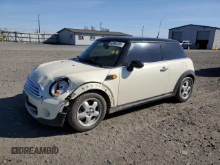 2011 MINI Hardtop with VIN WMWSU3C55BT182427, listed as a Copart auction lot 53084385 with 144,737 mi miles and Salvage Title. Bid and sale history available at DreamBid. Image 1.
