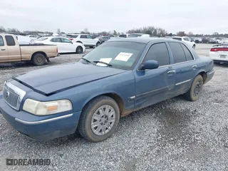 2007 Mercury Grand Marquis GS with VIN 2MEFM74V27X609128, listed as a IAAI auction lot 41474359 with 99,050 mi miles. Bid and sale history available at carsss.com. Image 6.
