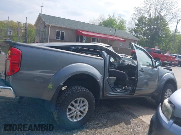 2019 Nissan Frontier SV z VIN 1N6AD0EVXKN775745, wystawiony jako IAAI lot #42221585 z przebiegiem 124 776 mil mil oraz . Historia ofert i sprzedaży dostępna na DreamBid. Obrazek 13.