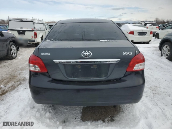2011 Toyota Yaris with VIN JTDBT4K37B1411178, listed as a Copart auction lot 88942045 with 213,527 mi miles and Salvage Title. Bid and sale history available at carsss.com. Image 6.