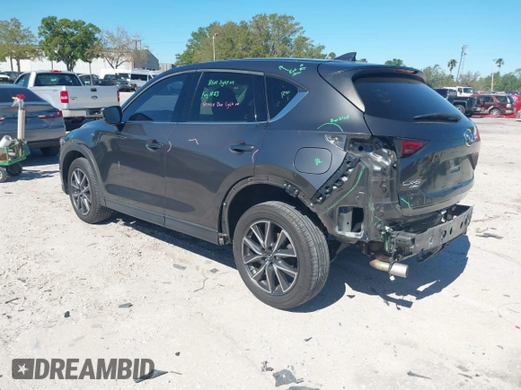 2018 Mazda CX-5 Grand Touring with VIN JM3KFBDM8J0314925, listed as a IAAI auction lot 41825917 with 70,027 mi miles. Bid and sale history available at carsss.com. Image 3.