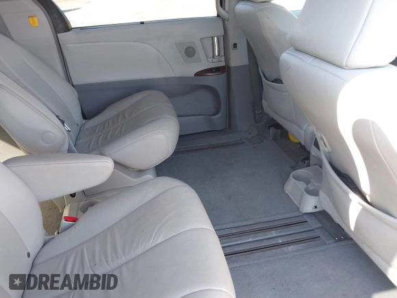 2011 Toyota Sienna XLE AAS with VIN 5TDYK3DCXBS114882, listed as a IAAI auction lot 42007417 with 144,087 mi miles and . Bid and sale history available at DreamBid. Image 8.