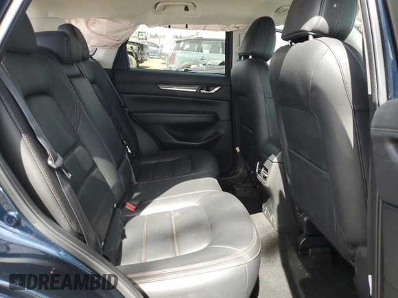 2021 Mazda CX-5 Grand Touring with VIN JM3KFBDM2M0494679, listed as a Copart auction lot 50017675 with 25,965 mi miles and Salvage Title. Bid and sale history available at carsss.com. Image 11.