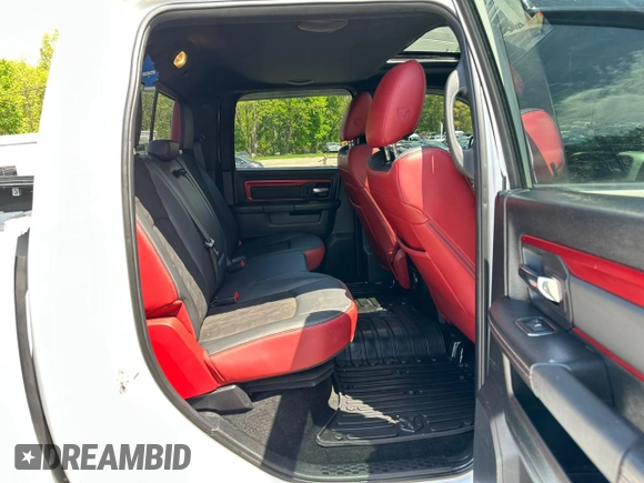 2016 Ram 1500 Rebel z VIN 1C6RR7YT9GS260844, wystawiony jako Copart lot #57285075 z przebiegiem 134 704 mil mil oraz Tytuł czysty. Historia ofert i sprzedaży dostępna na DreamBid. Obrazek 5.